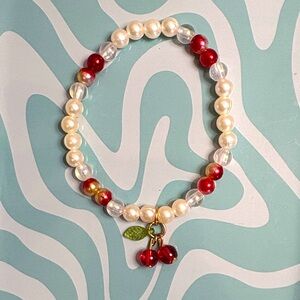 Red and White Beaded Bracelet with Cherry Charm